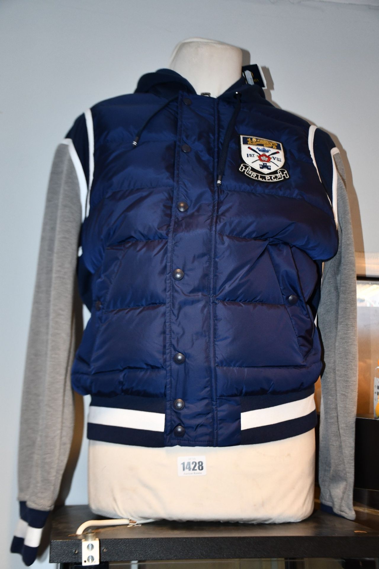 An as new Ralph Lauren down panelled baseball jacket (M - RRP €185).
