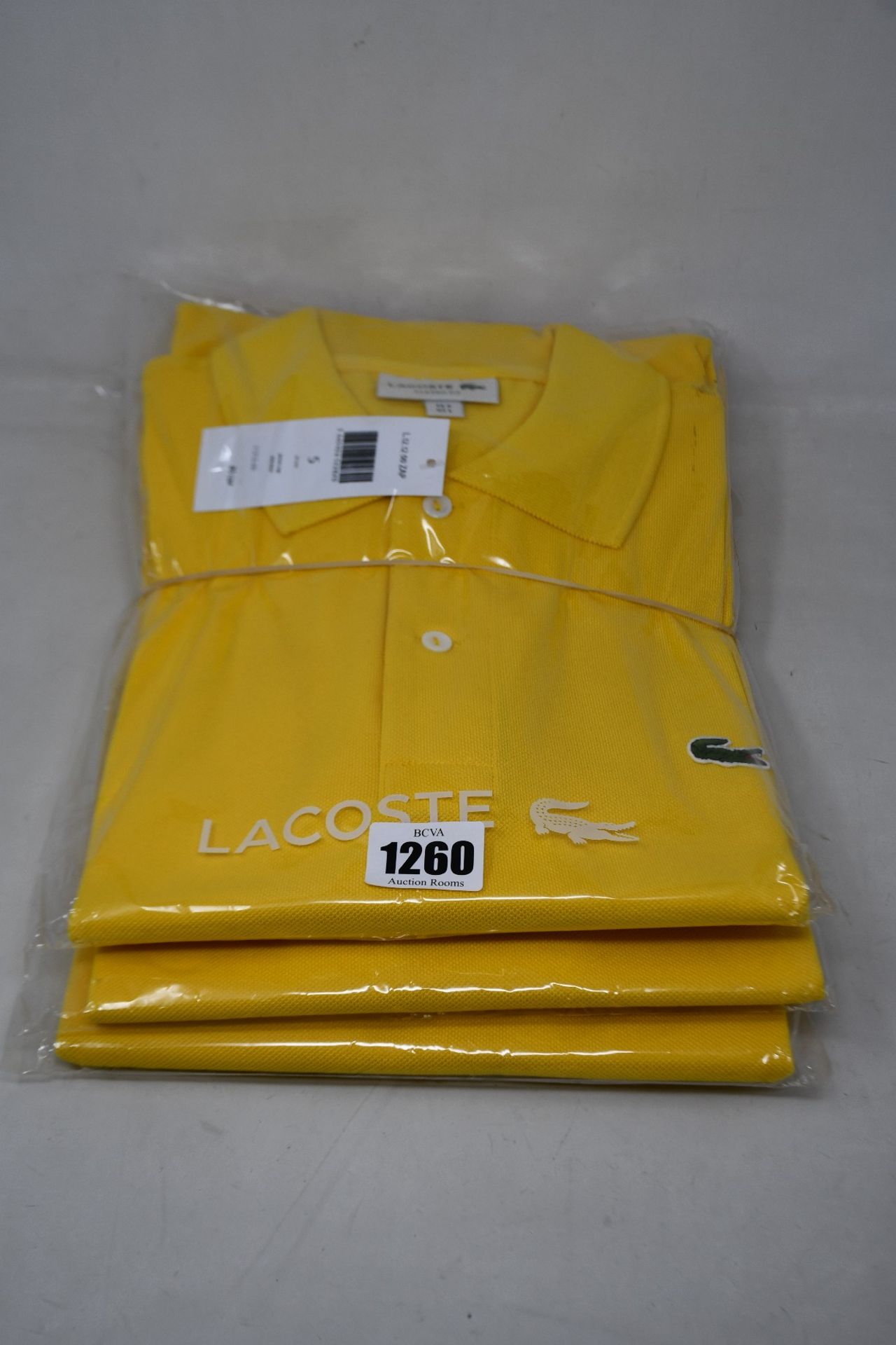 Three as new Lacoste polo shirts in yellow (FR 5/US L - RRP £85 each).