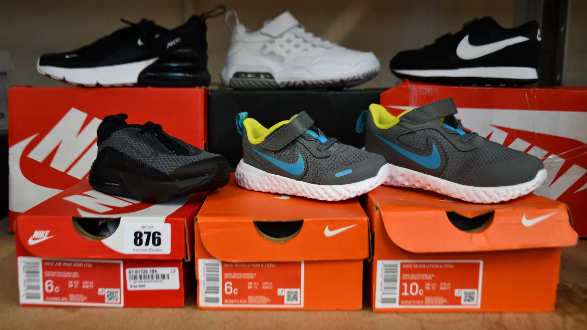 Six pairs of children's/toddlers assorted as new Nike trainers.