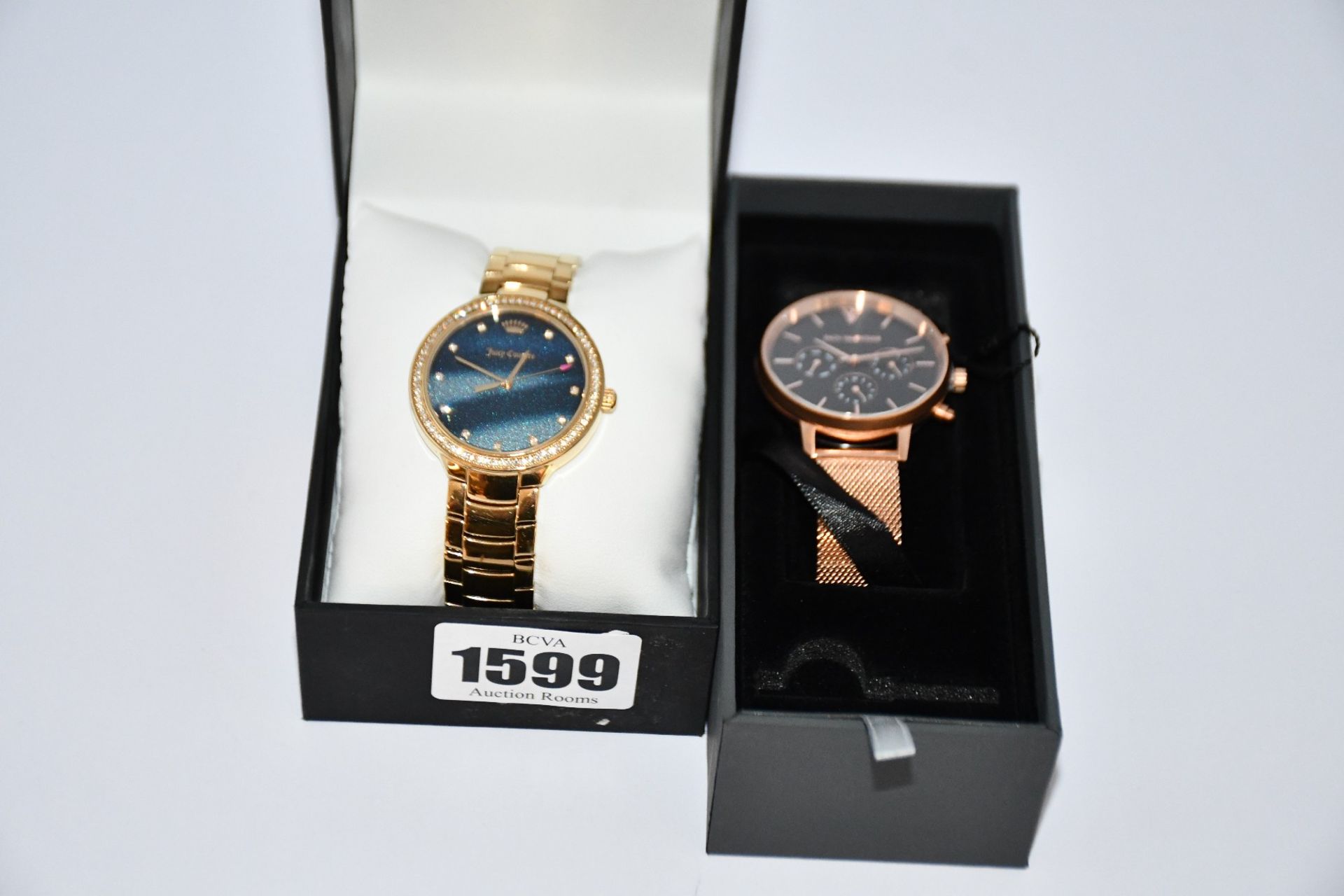 Two women's as new watches; Juicy Couture Black Label and Paul Valentine together with a gents