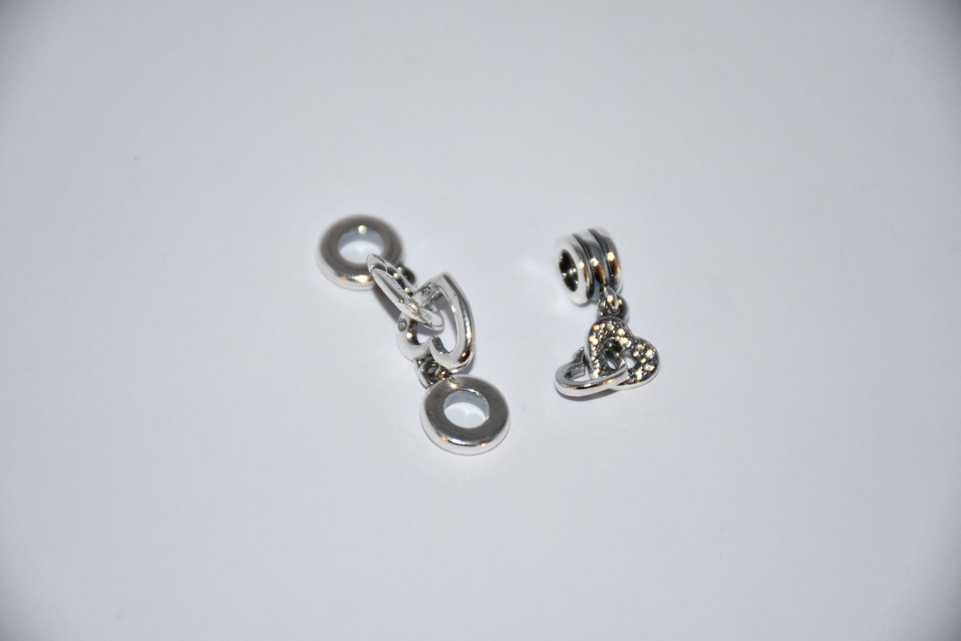 Two Pandora Linked Sister Hearts Split Dangle charms (RRP £45) and a Pandora Interlocking Heart