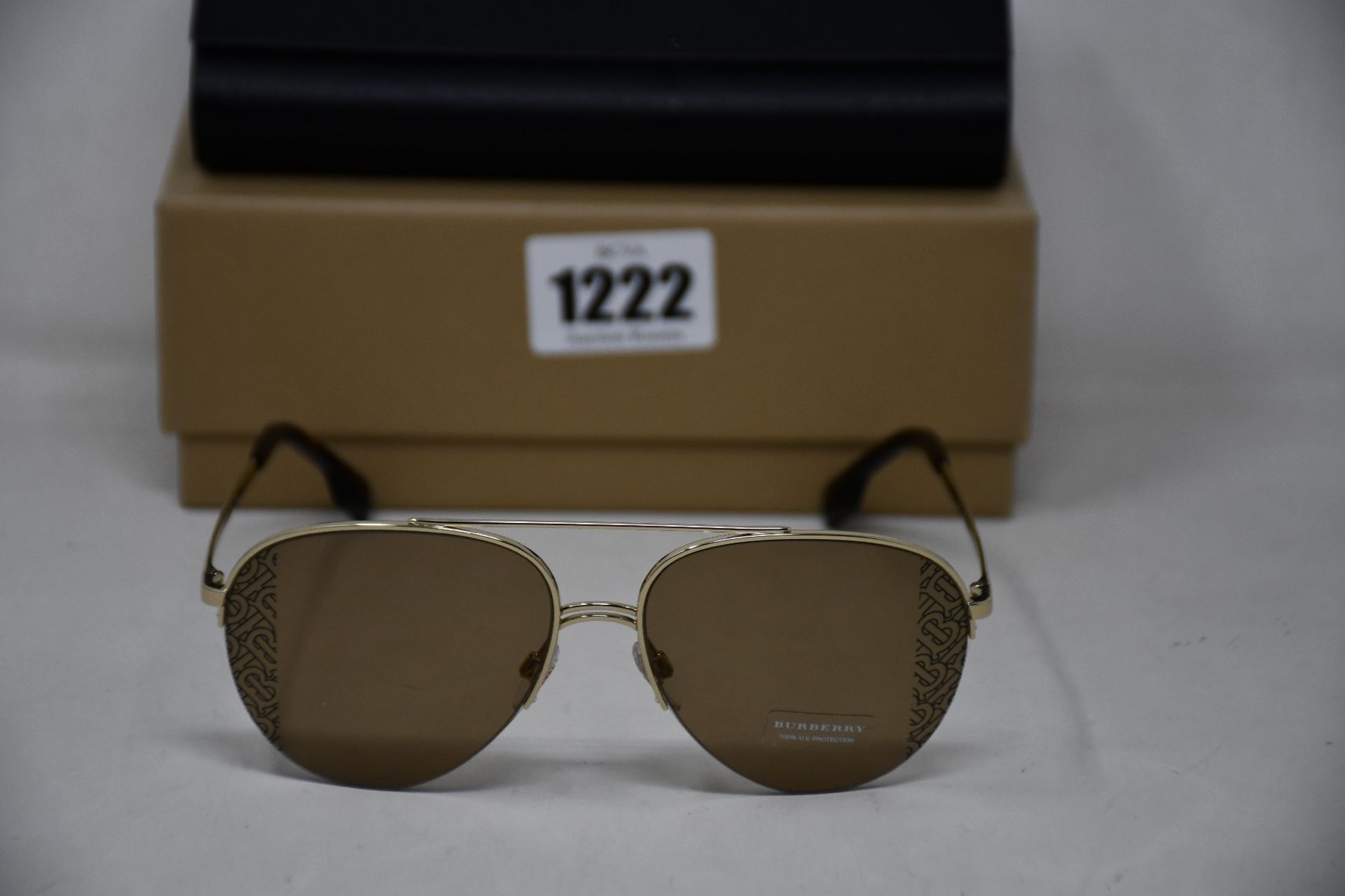A pair of as new Burberry sunglasses.