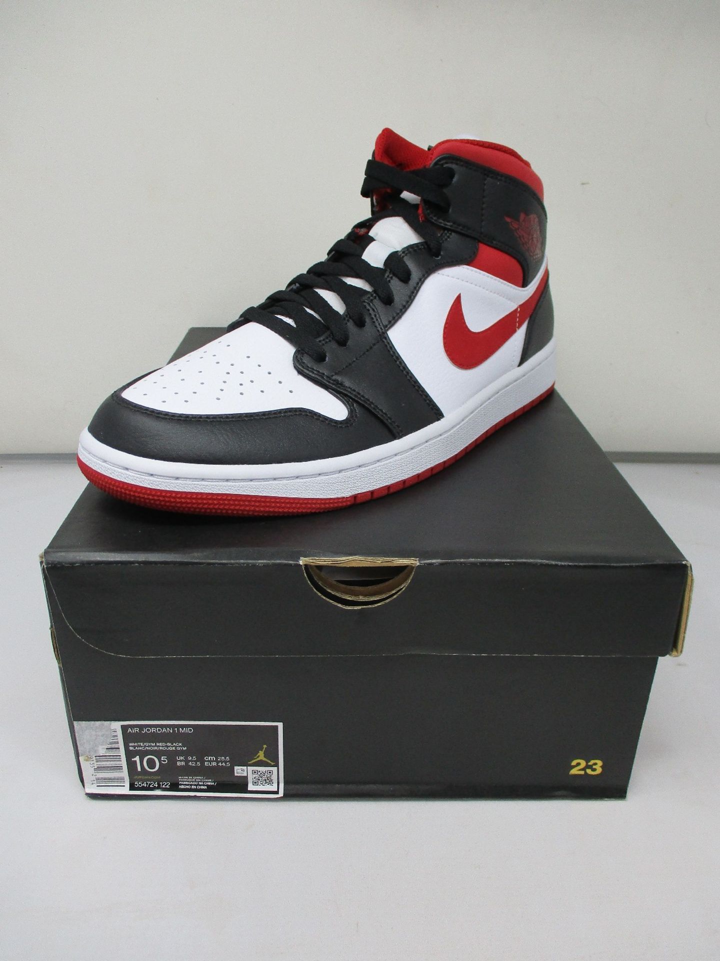 A pair of as new Nike Air Jordan 1 Mid (UK 9.5).