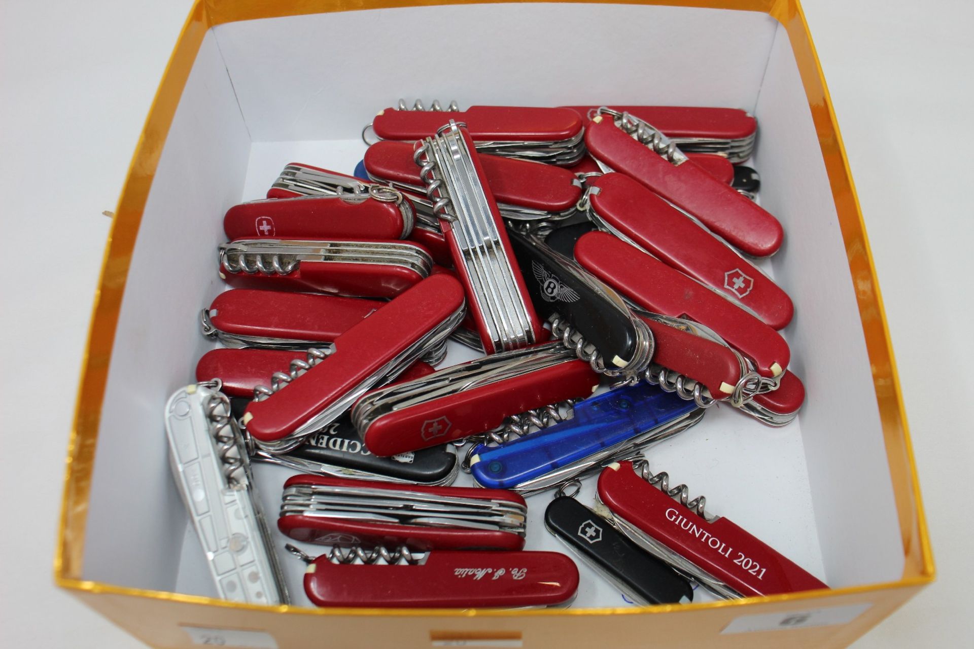 A box of Victorinox Swiss Army knives (Approximately 25 items) (Over 18s only).