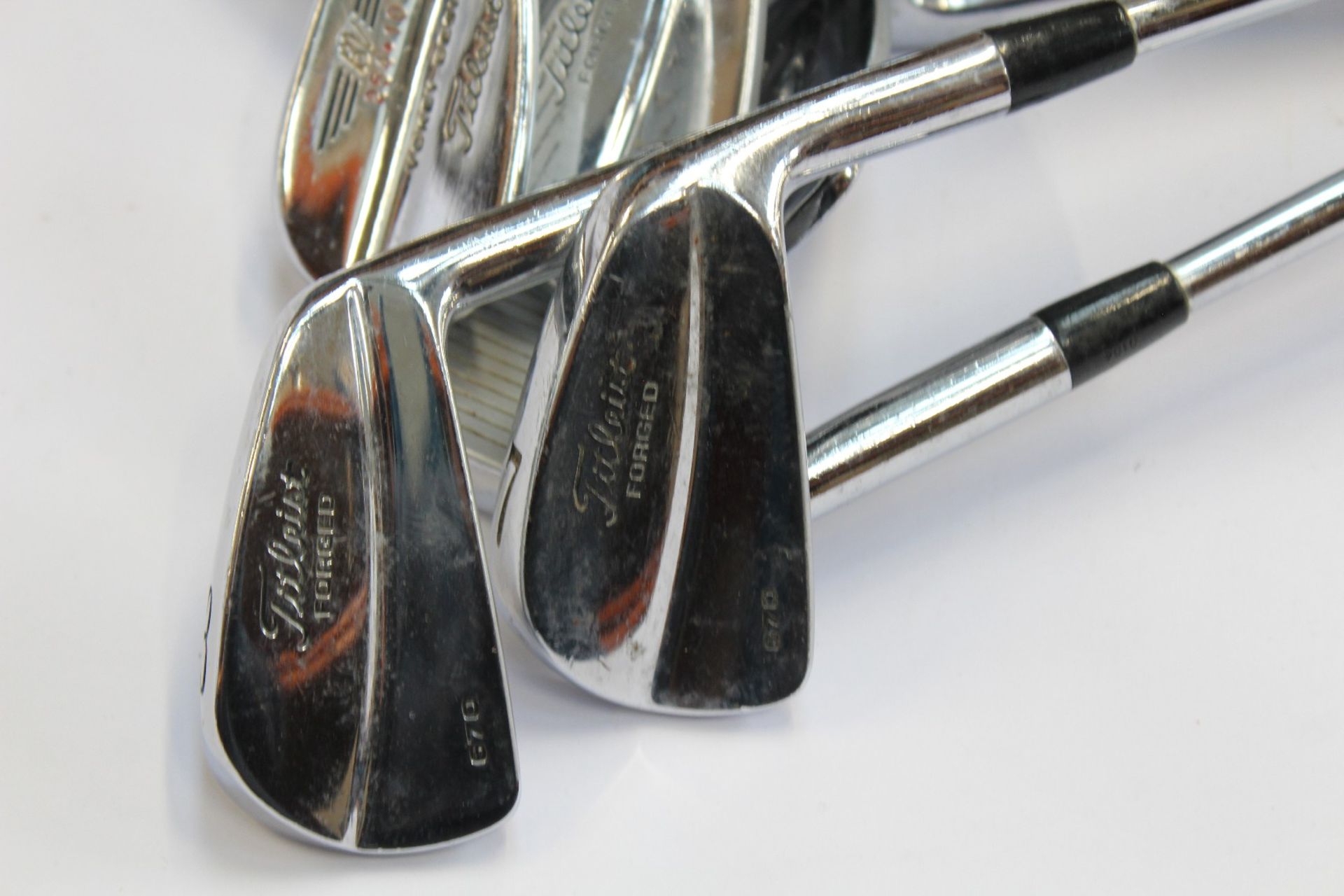 Eleven pre-owned Titleist 670 and Vokey design forged golf clubs to include clubs (2,3,4,5,6,7,8,9,