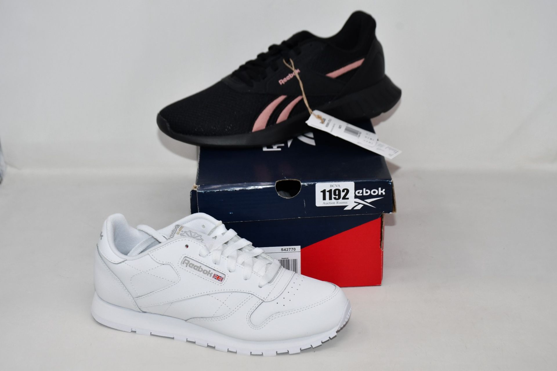 Three pairs of as new Reebok trainers; two Lite 2.0 (UK 6.5 - one pair unboxed) and a pair of