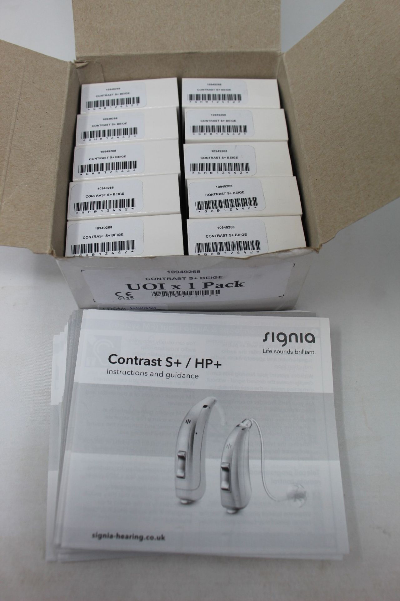 Ten boxed as new Signia Contrast S+ hearing aids in Beige.