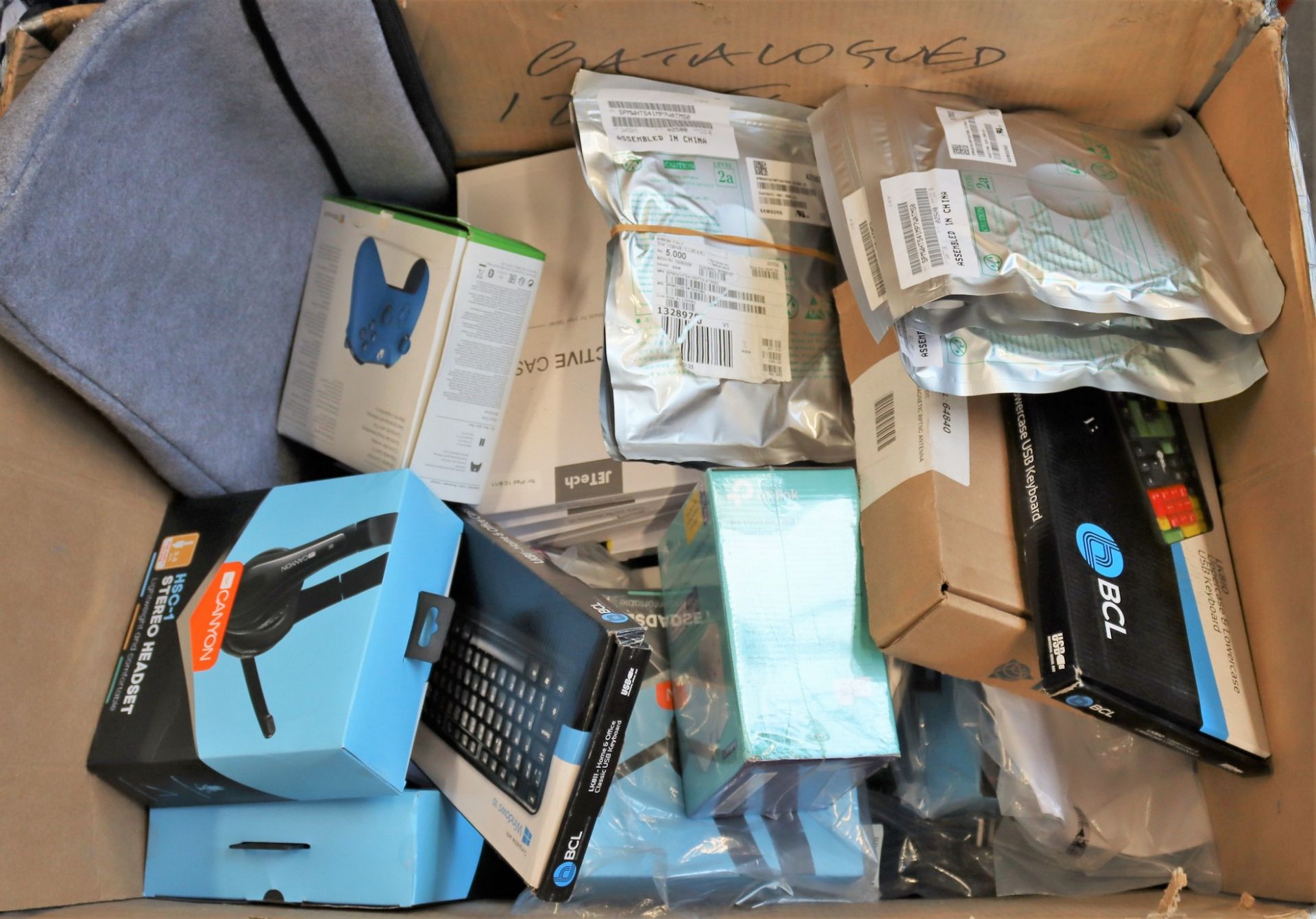 COLLECTION ONLY: A box of assorted new and pre-owned electronic items and accessories (All items