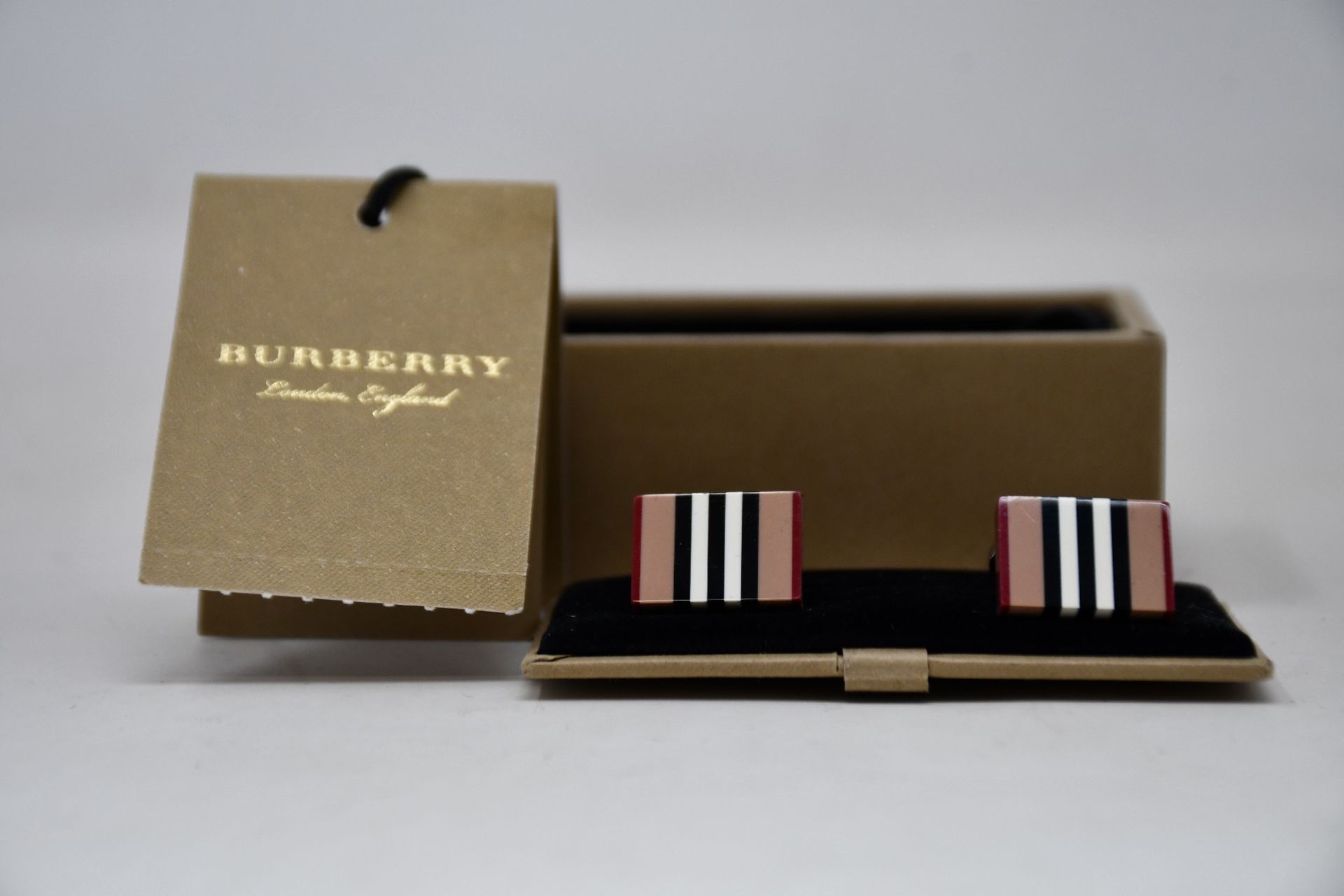 Two pairs of as new Burberry cufflinks (RRP £95 each).