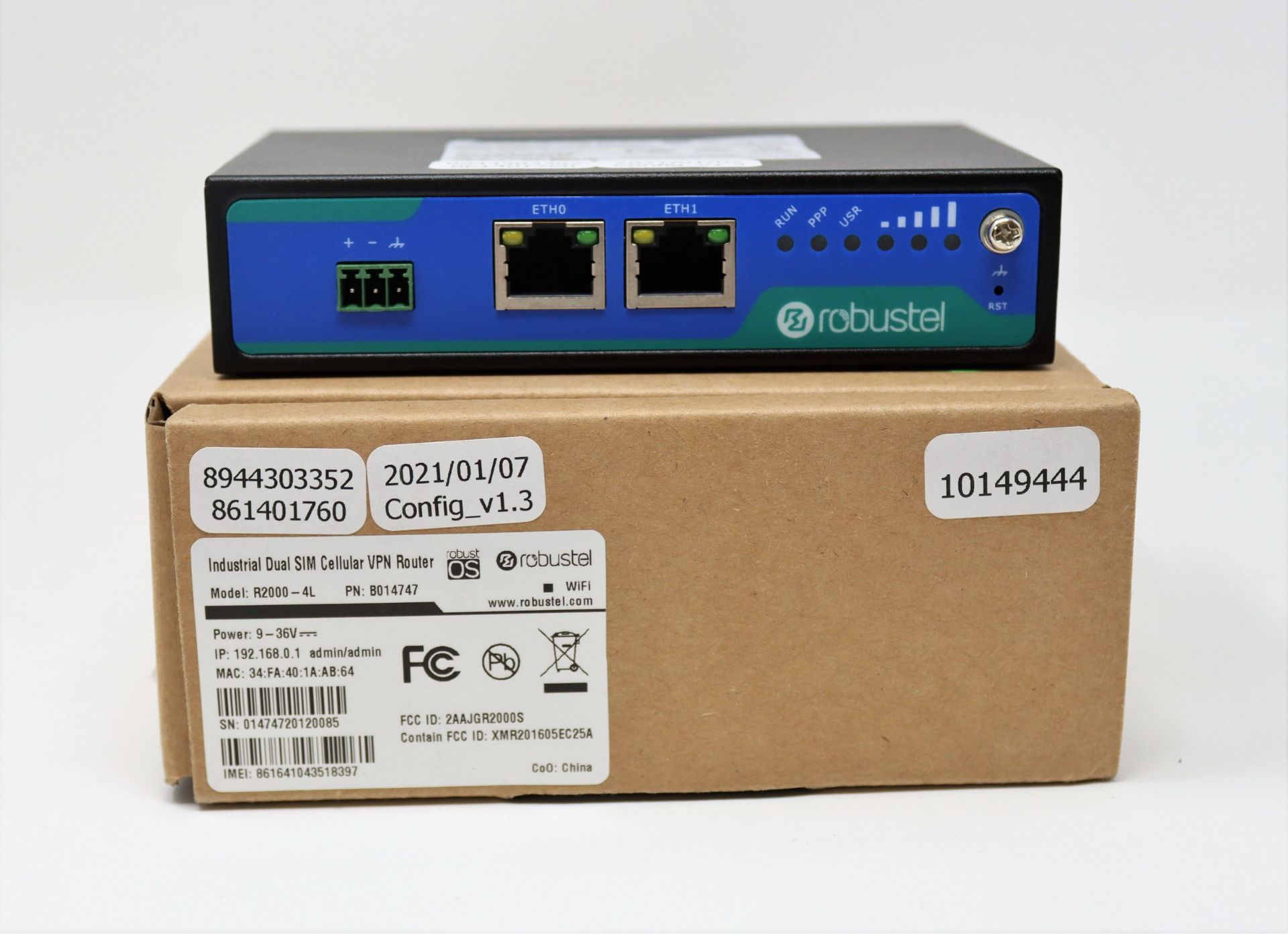 A boxed as new Robustel R2000-4L Industrial Dual SIM Cellular VPN Router (P/N: B014747).