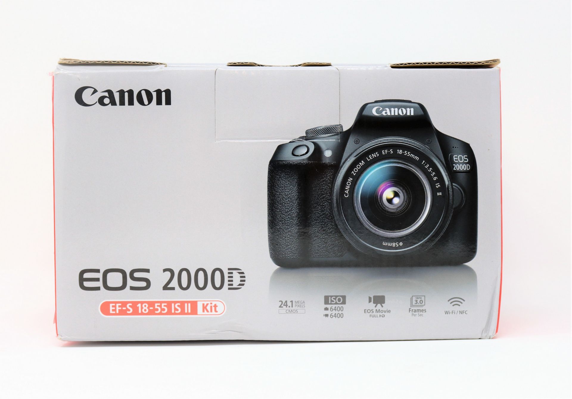 A boxed as new Canon EOS 2000D and EF-S 18-55mm IS II Lens Kit (UK plug charger included).