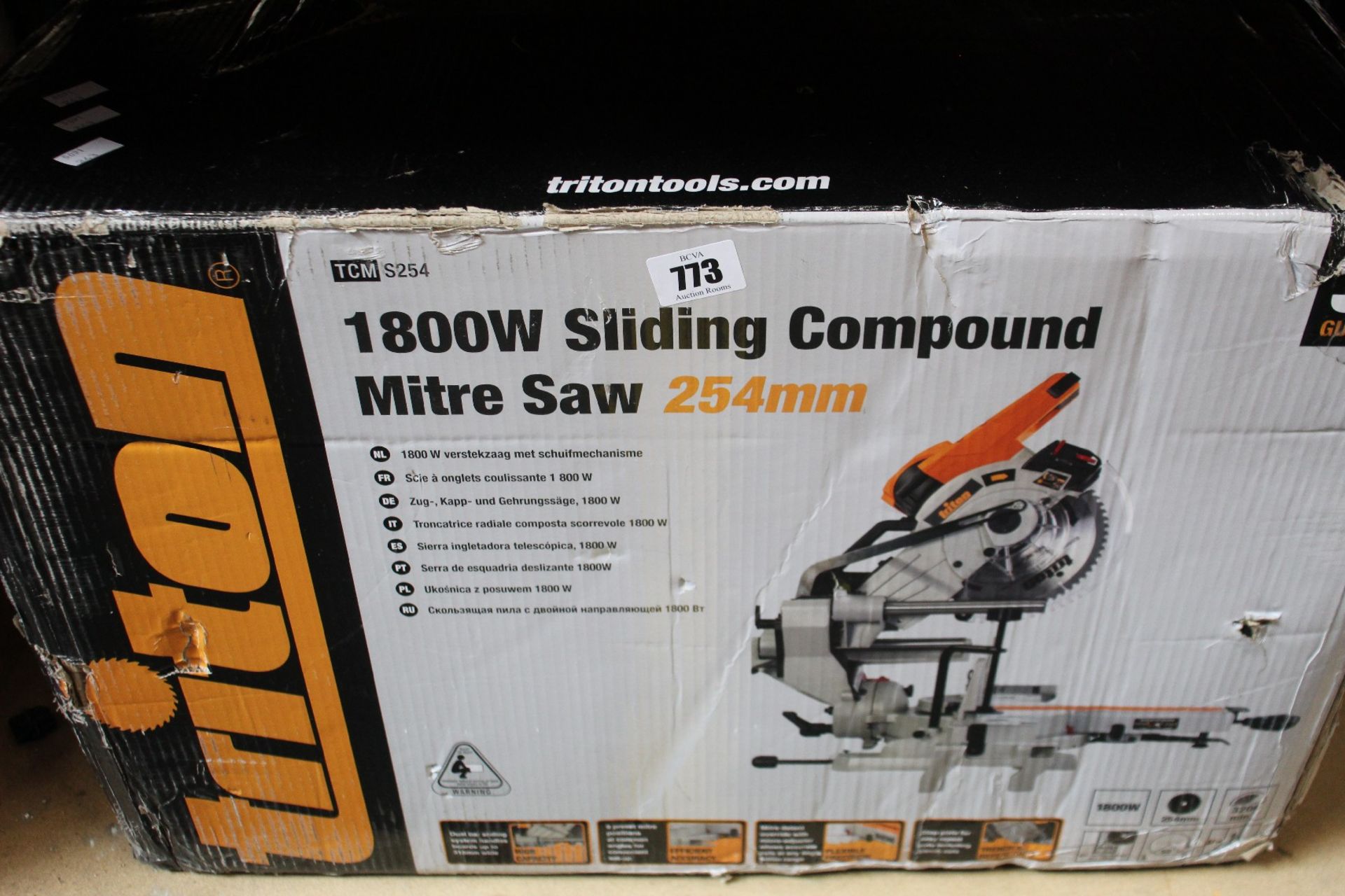 A Triton TCMS254 1800W Sliding Compound Mitre Saw.