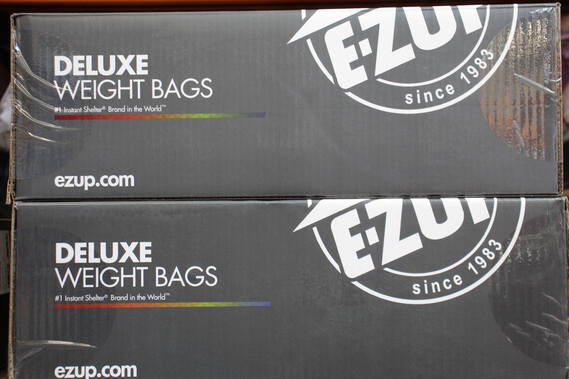 Two sets of four as new E-Z Up Deluxe Weight Bags (WB3GYBK4).