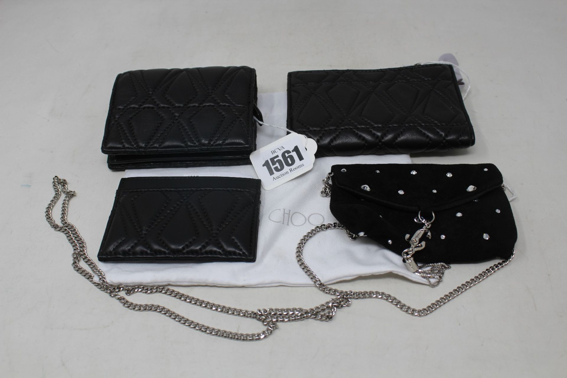 Two as new Jimmy Choo purses, a small pouch on chain and a card holder (No tags, photography