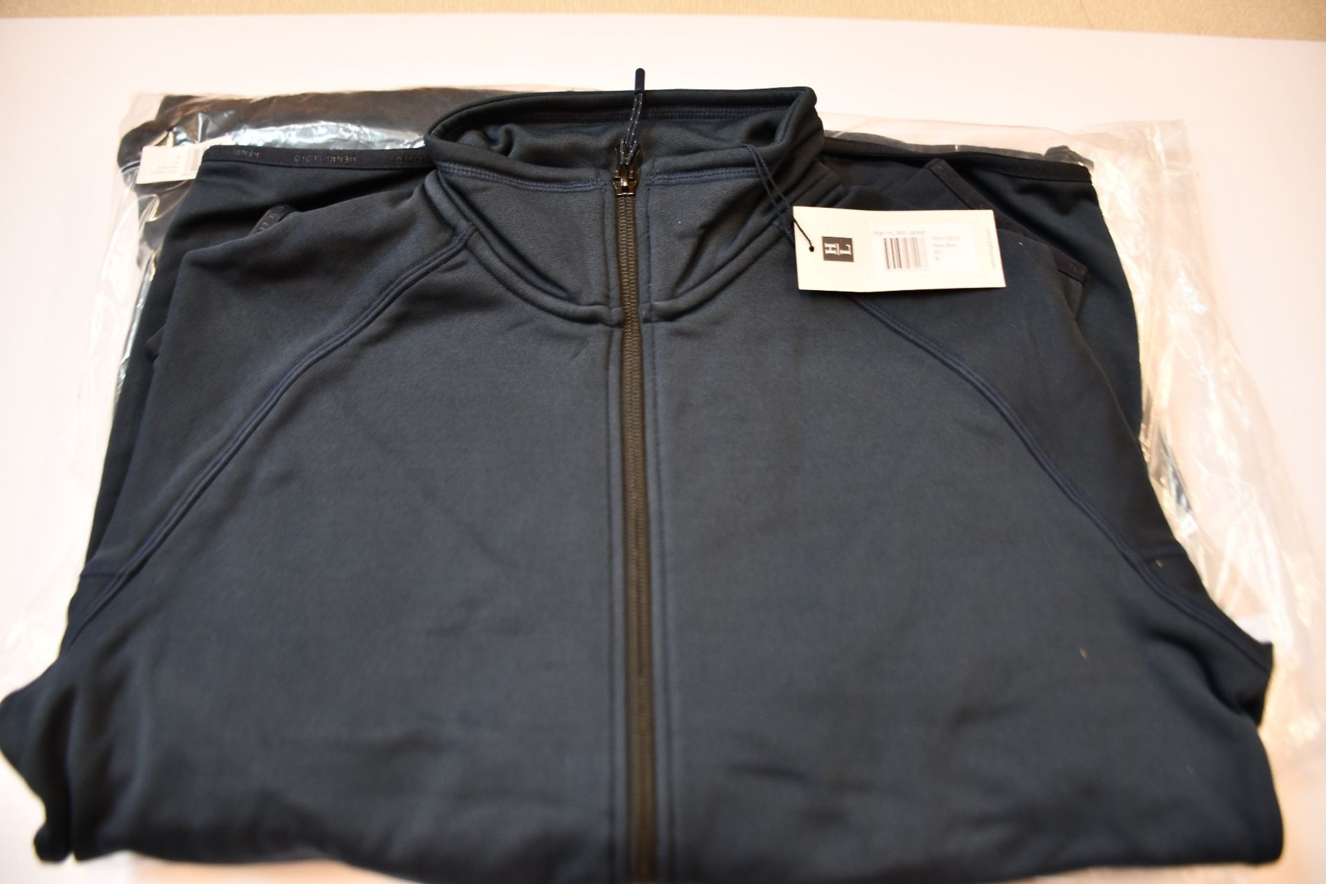 An as new Henri Lloyd Maverick mid zip hoodie (XL) and two Maverick Mid jackets (M).