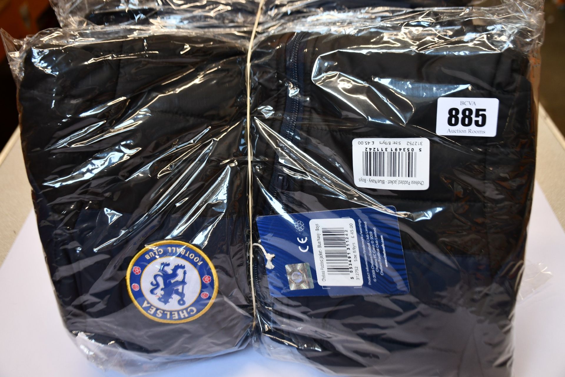 Four children's as new Official Chelsea F.C. padded coats (8-9 years - RRP £45 each).