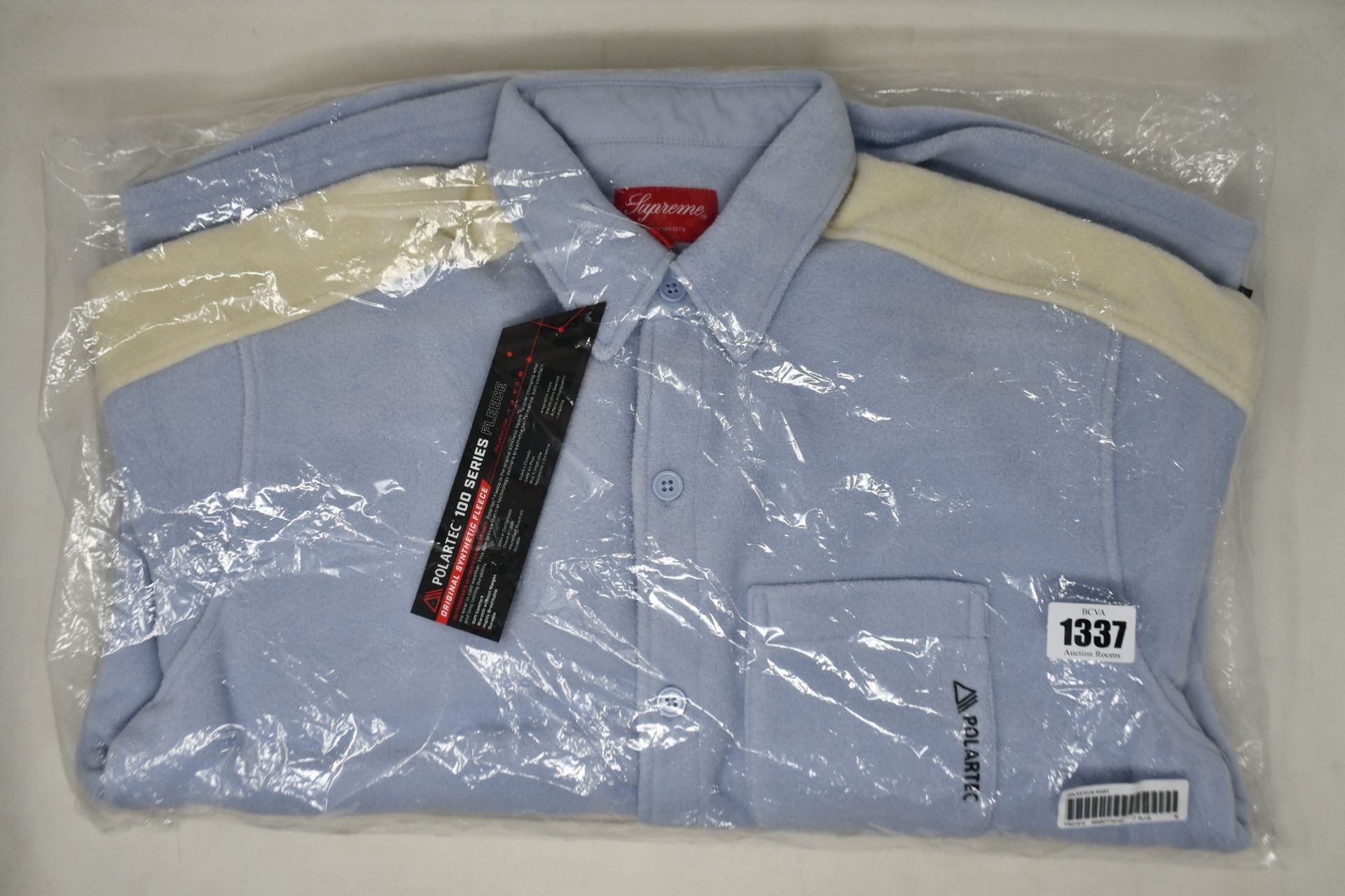 An as new Supreme Polartec shirt in light blue (M).