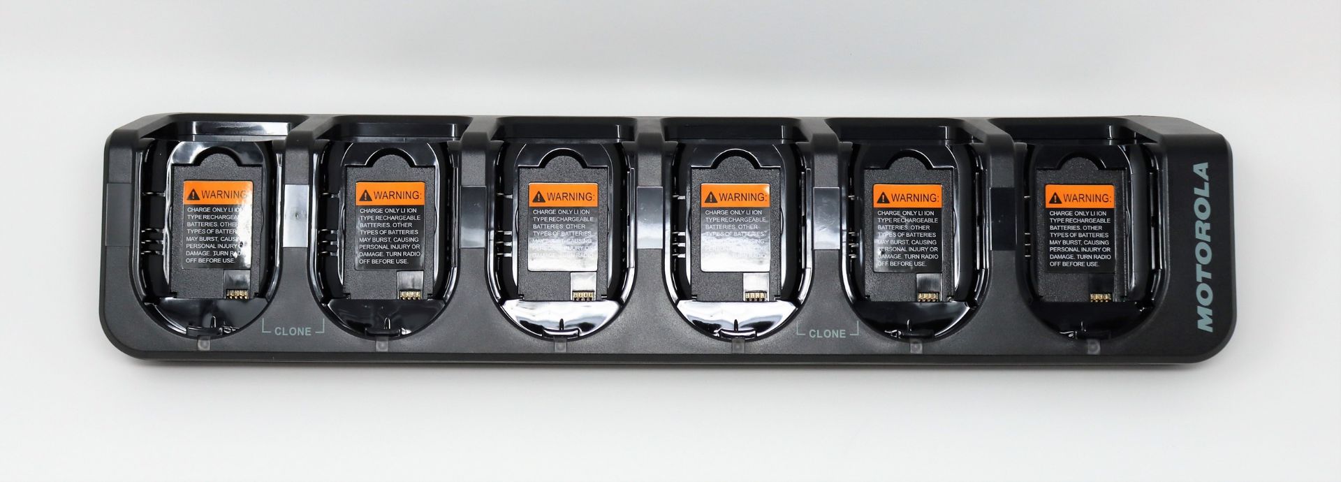 A boxed as new Motorola CLP Six Way Multi Unit Charger (P/N: IXPN4029B) (Box opened. UK power