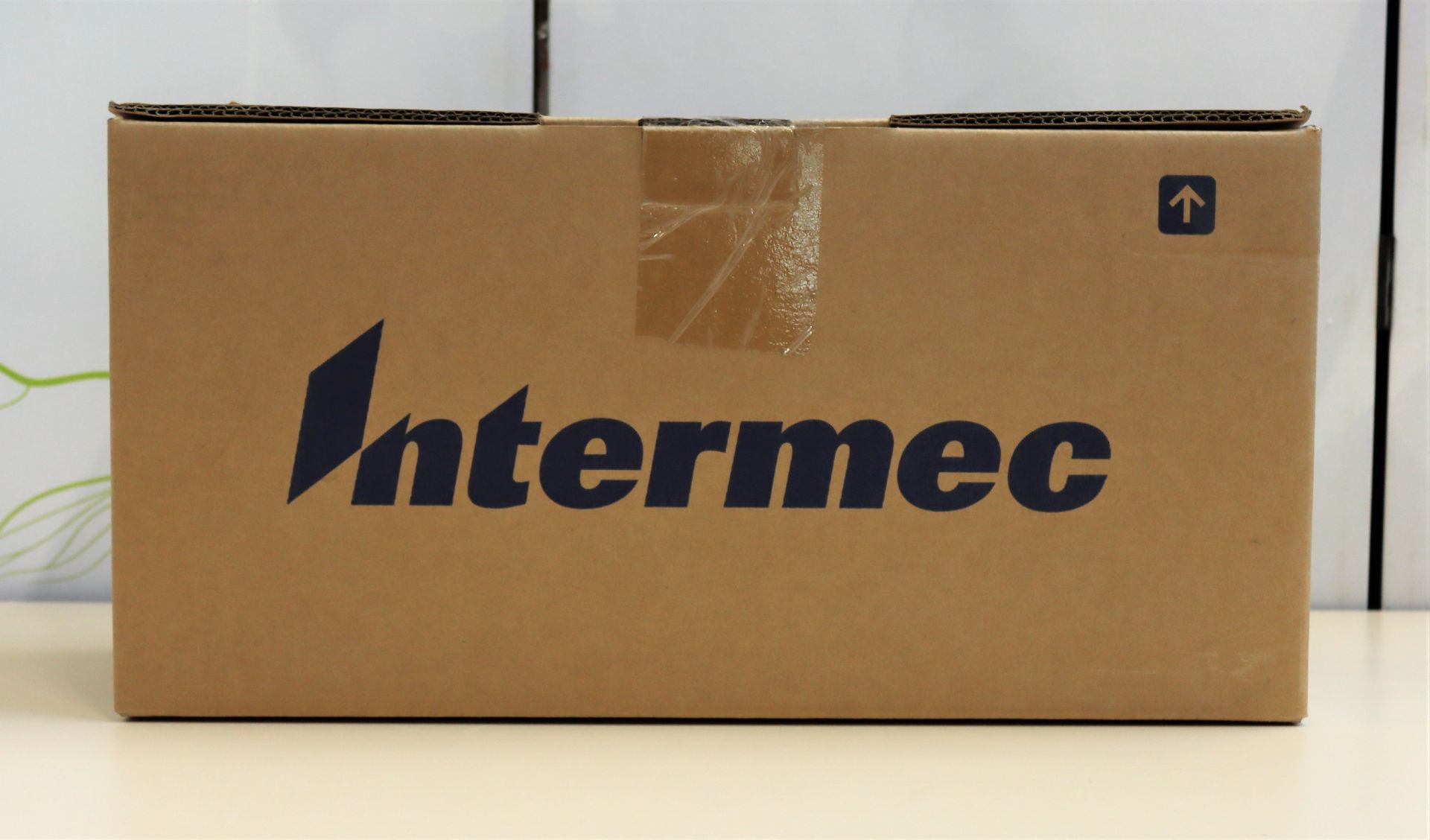 A boxed as new Intermec DX4A2111100 4 Bay CN70 Barcode Scanner Cradle Charger (Box sealed).