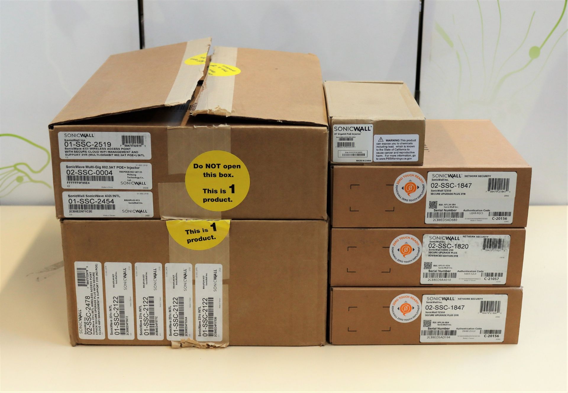 COLLECTION ONLY: A quantity of boxed as new SonicWall items; Four SonicWave 231C Wireless Access