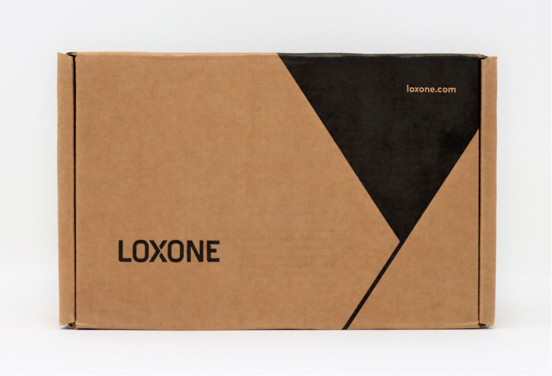 A boxed as new Loxone Dimmer Extension (Box sealed).