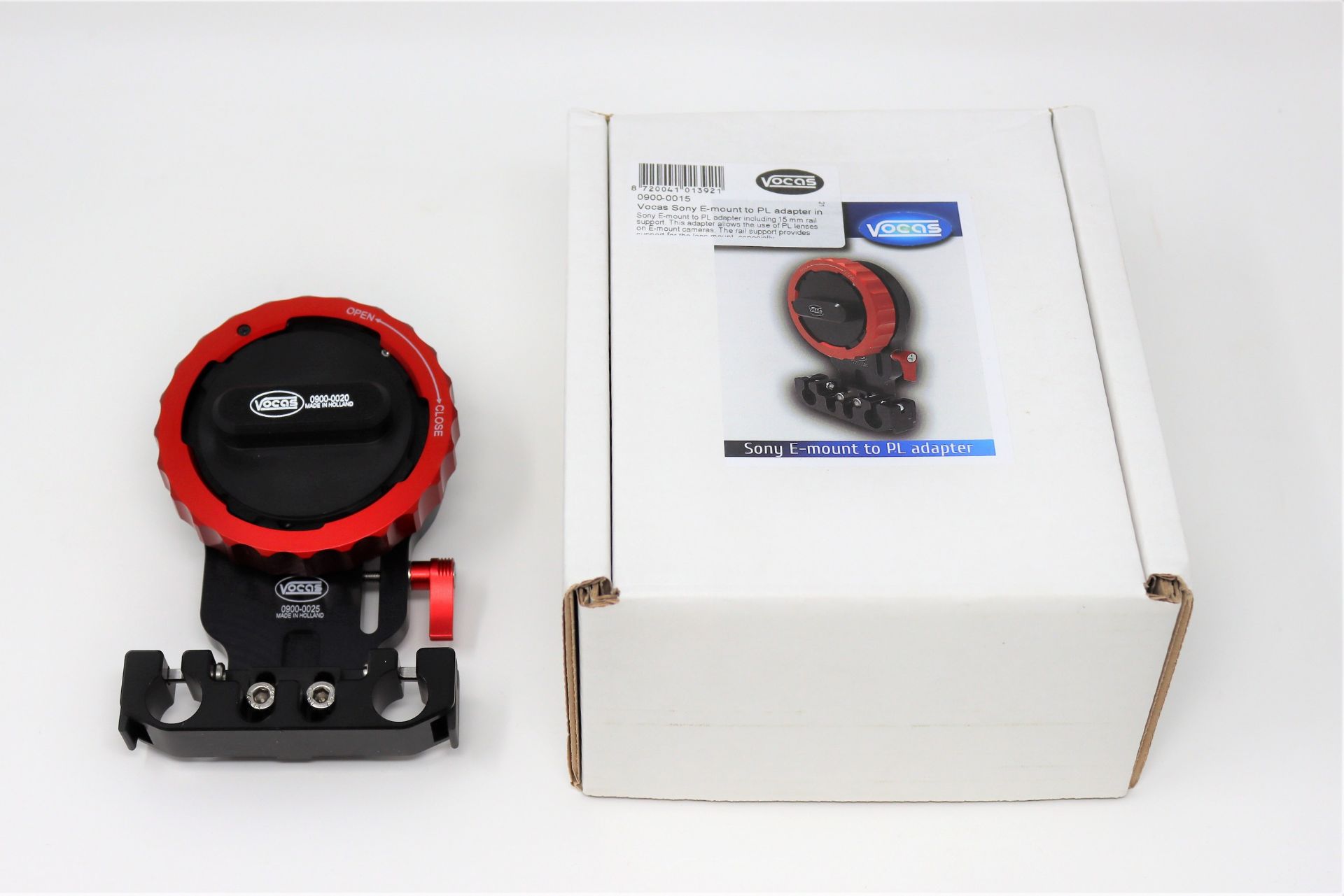 A boxed as new Vocas Sony E-mount to PL adapter including 15 mm rail support (P/N: 0900-0015).