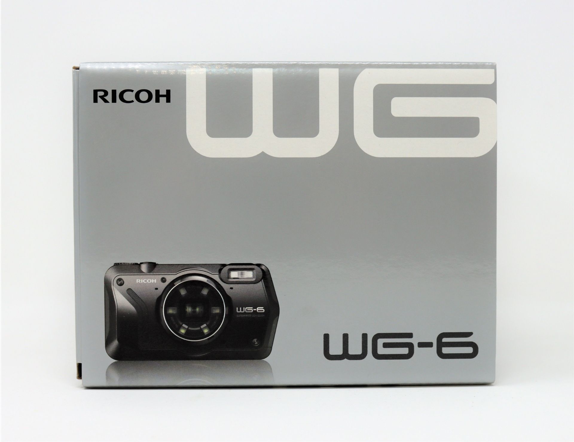 A boxed as new Ricoh WG-6 Tough Digital Camera in Orange (Box sealed).