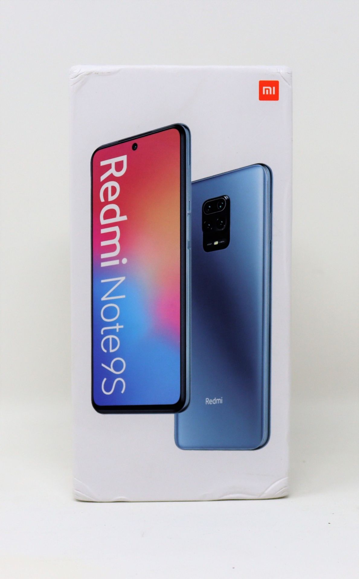 A boxed as new Xiaomi Redmi Note 9S 128GB in Aurora Blue (Box opened, some damage to box. 2-pin plug