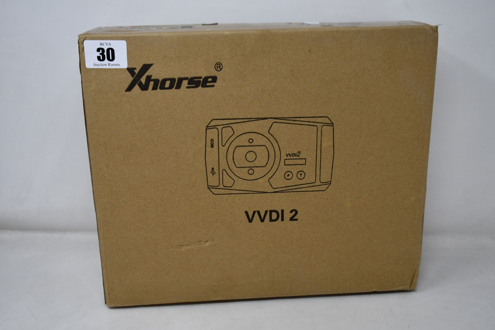 A boxed as new Xhorse VVDI 2 key programming OBD device.