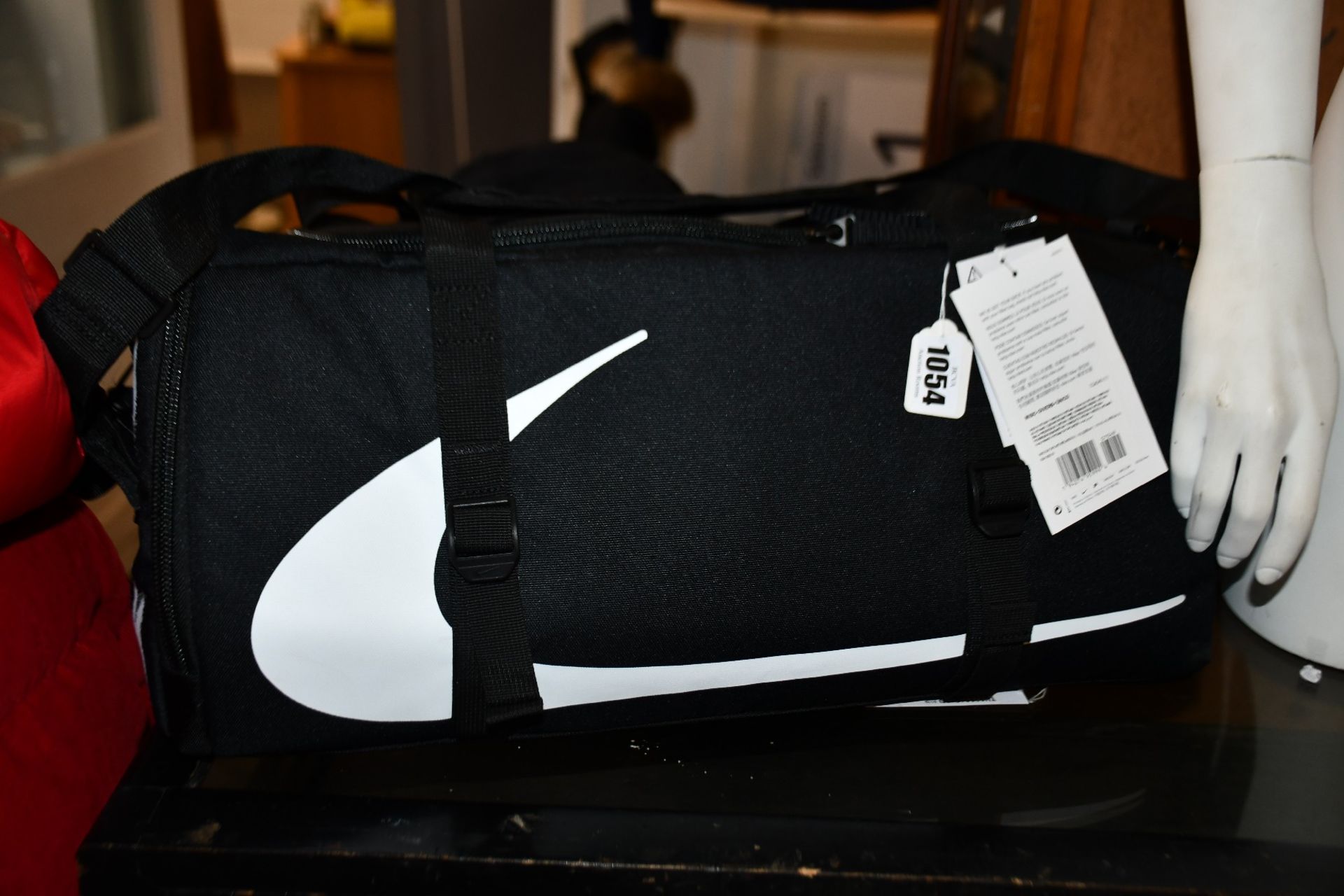 An as new Off White x Nike duffle/waist bag combo.