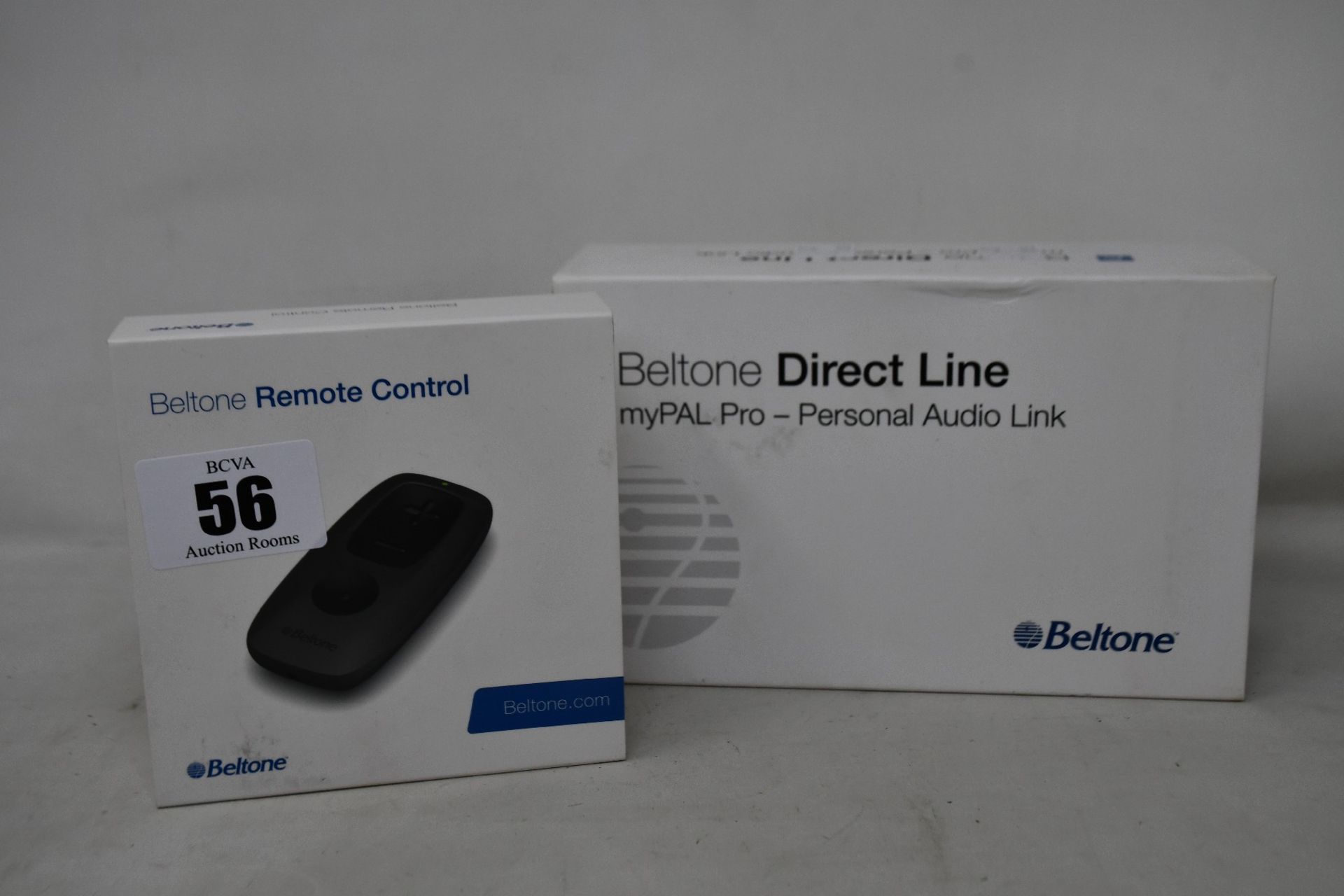 A Beltone remote control (EAN: 5708296184279) and a Beltone myPAL Pro personal audio link (EAN: