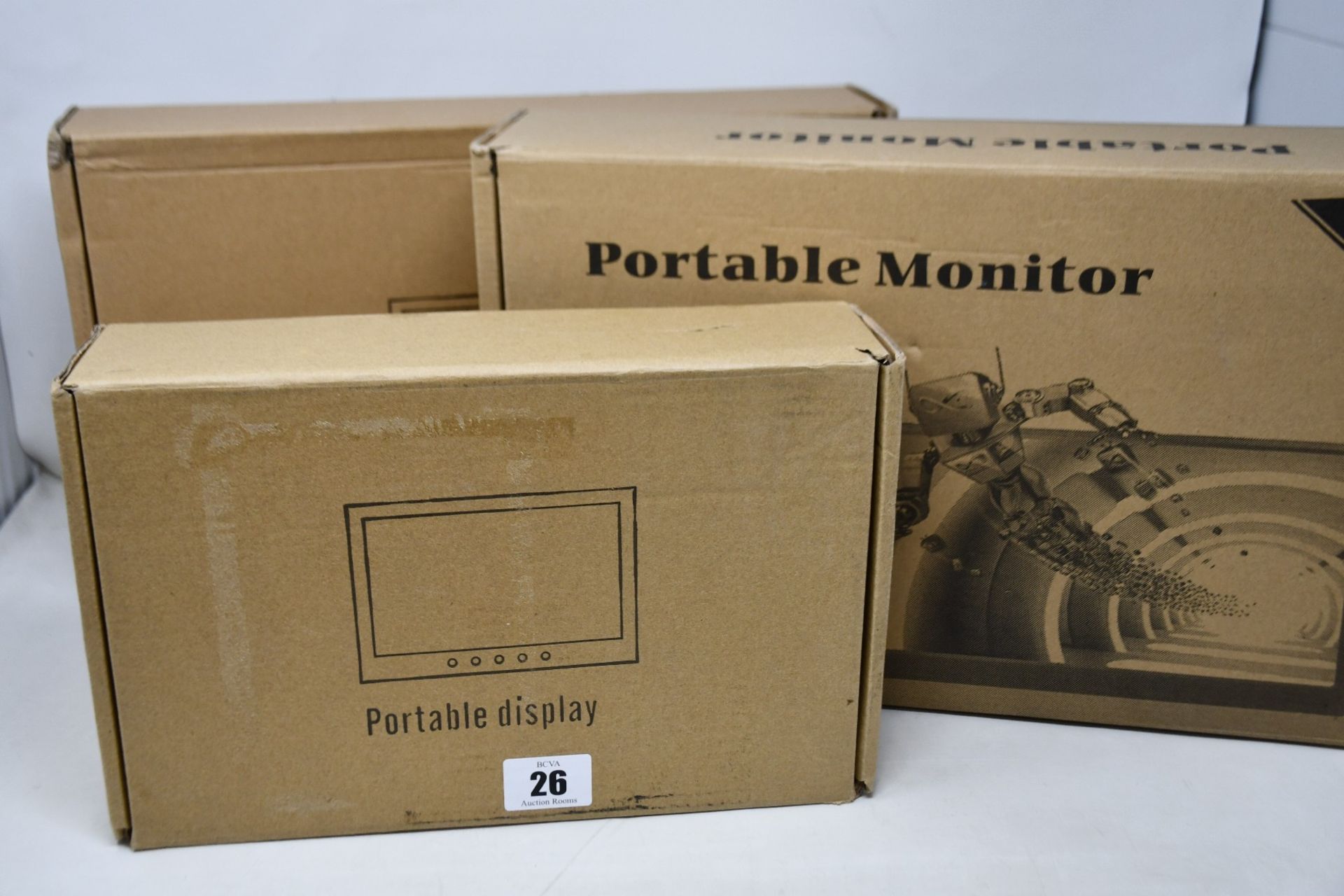 Two boxed Koolertron slim 15.6 1080P monitor and a Koolertron 11.6 inch portable monitor