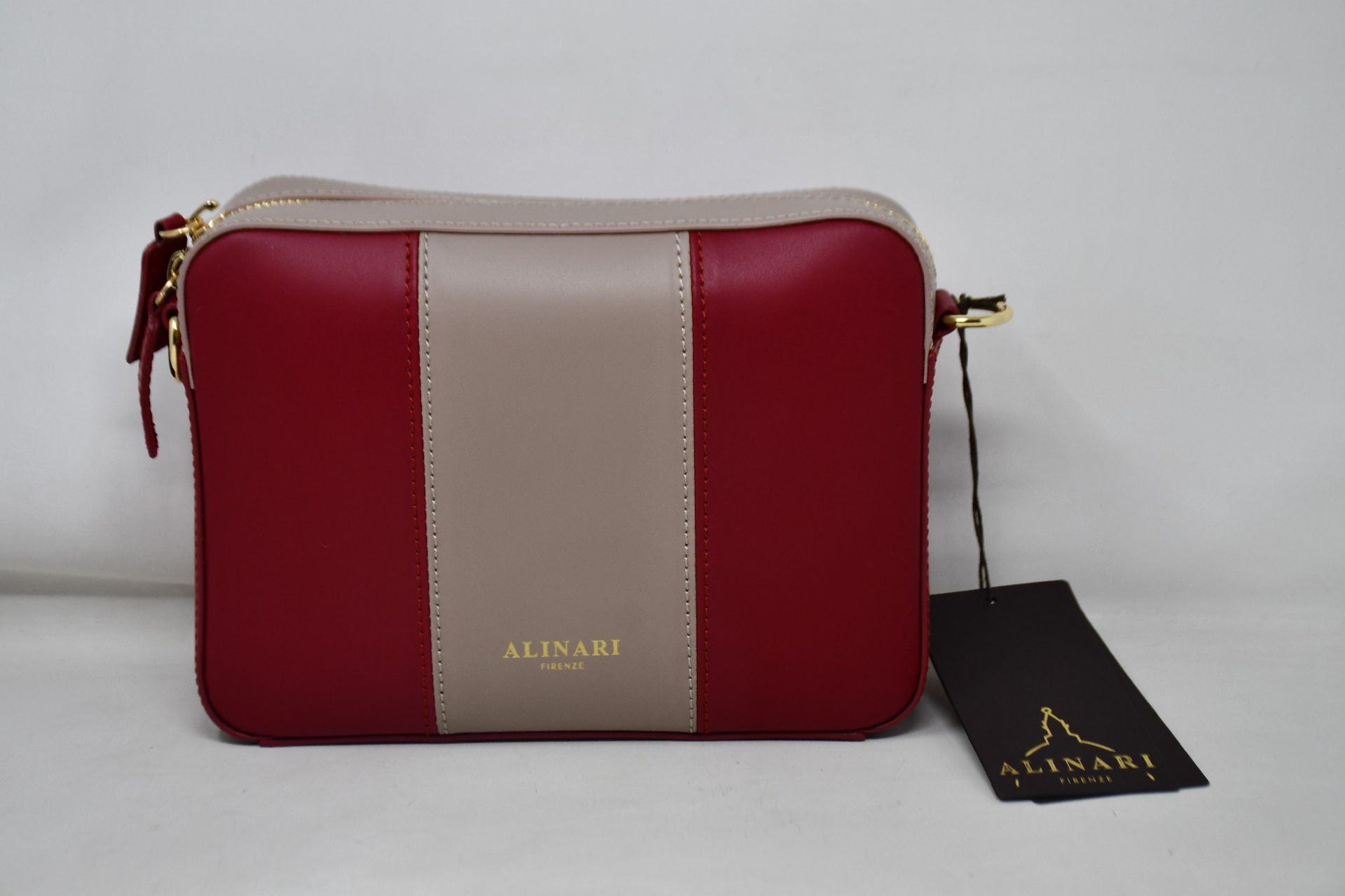 An as new Alinari Firenze Flavia crossbody bag in red/taupe.