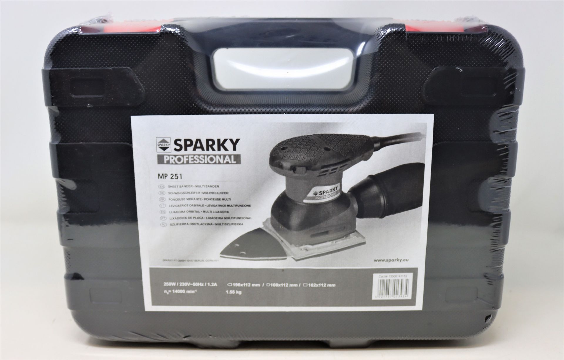 An as new Sparky professional sander (MP251) and two packs of Sparky sanding papers.