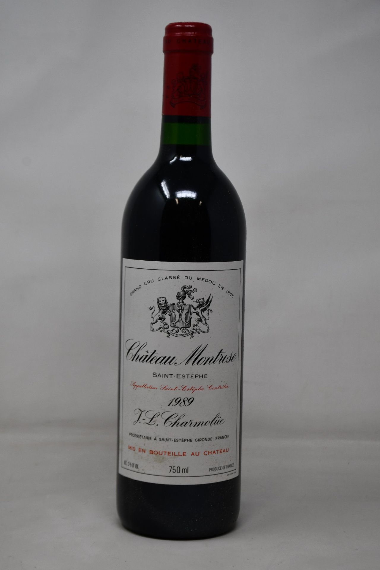 A bottle of 1989 Chateau Montrose Saint-Estephe J L Charmolüe (Over 18s only).