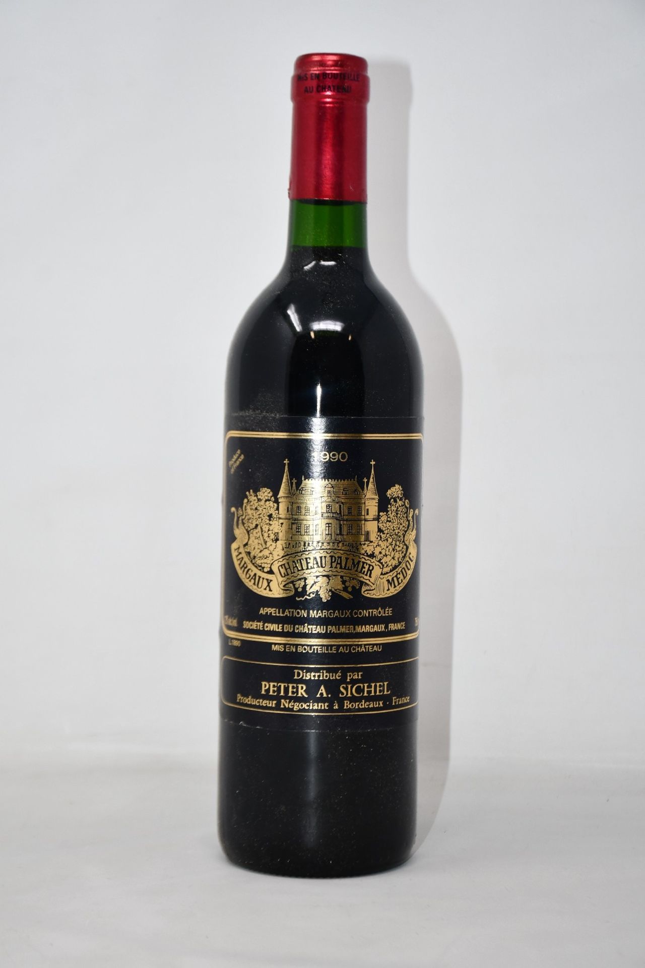 A bottle of 1990 Chateau Palmer Margeaux Medoc (Over 18s only).