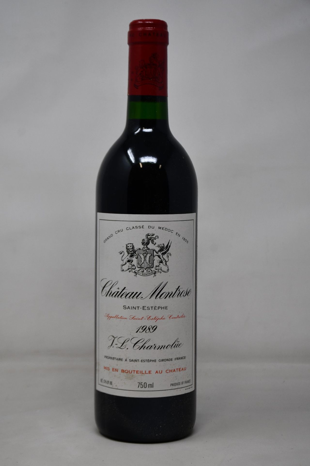 A bottle of 1989 Chateau Montrose Saint-Estephe J L Charmolüe (Over 18s only).