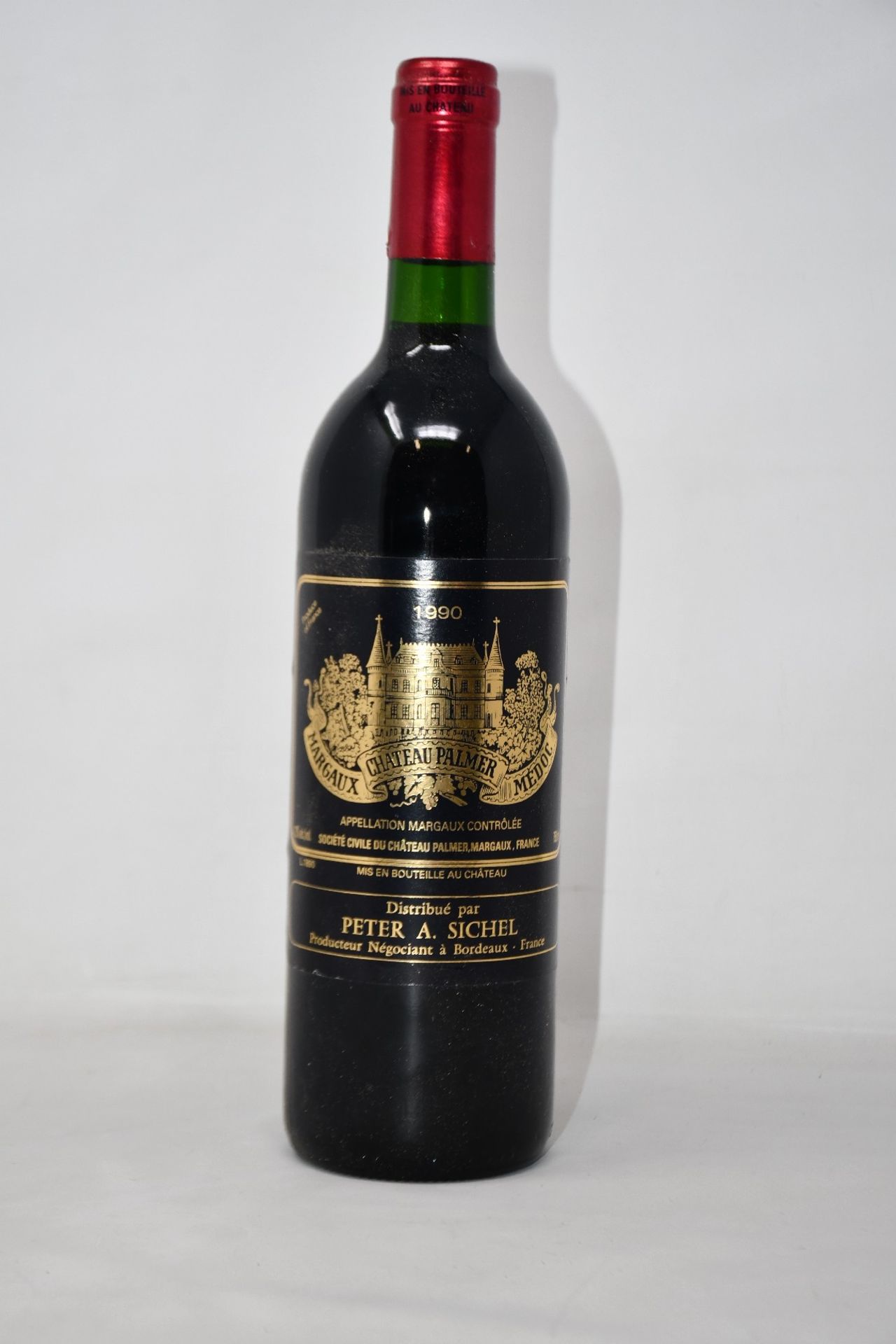 A bottle of 1990 Chateau Palmer Margeaux Medoc (Over 18s only).