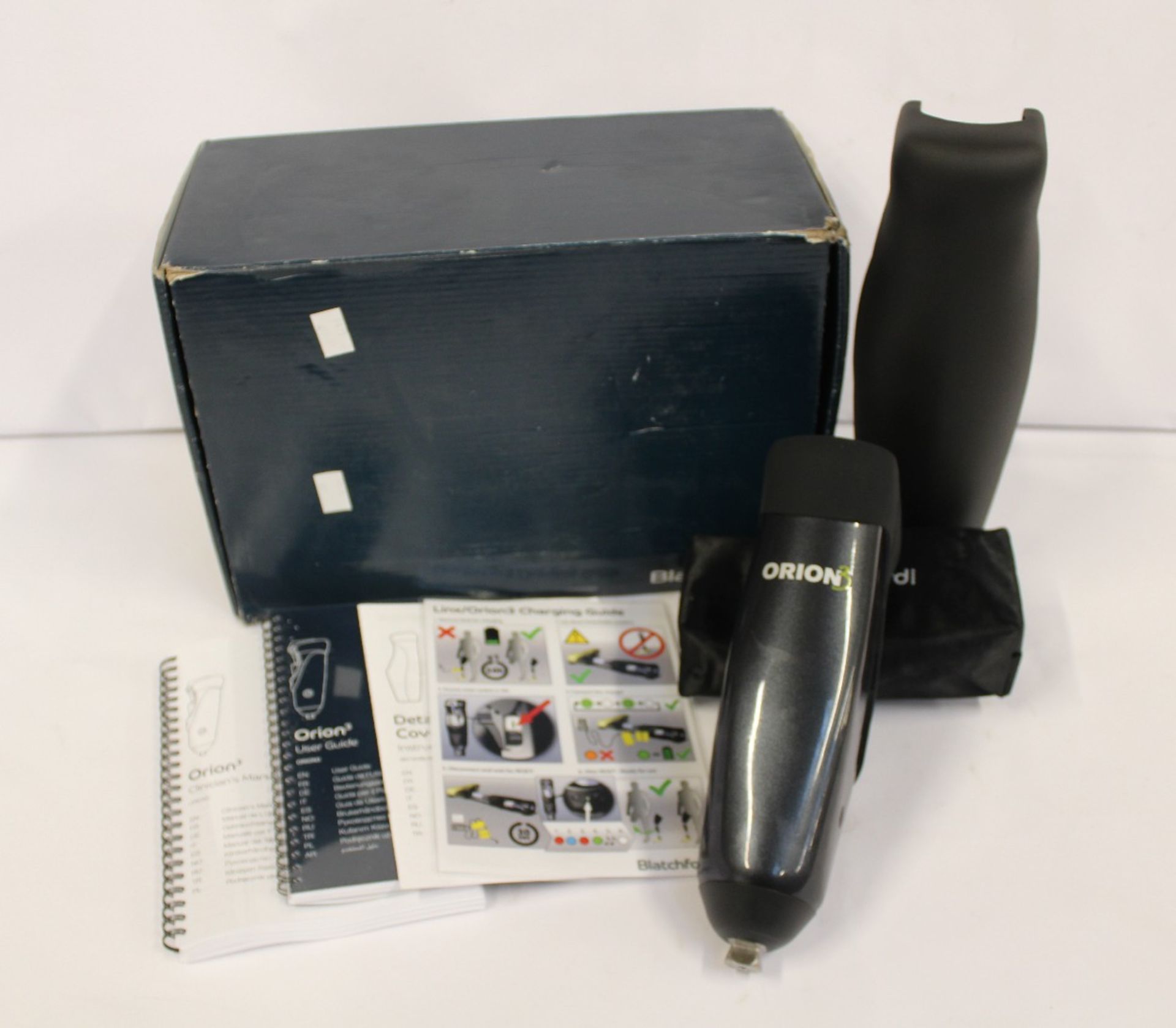 A boxed as new Blatchford ORION3 external knee prosthesis, with charger and multiple power