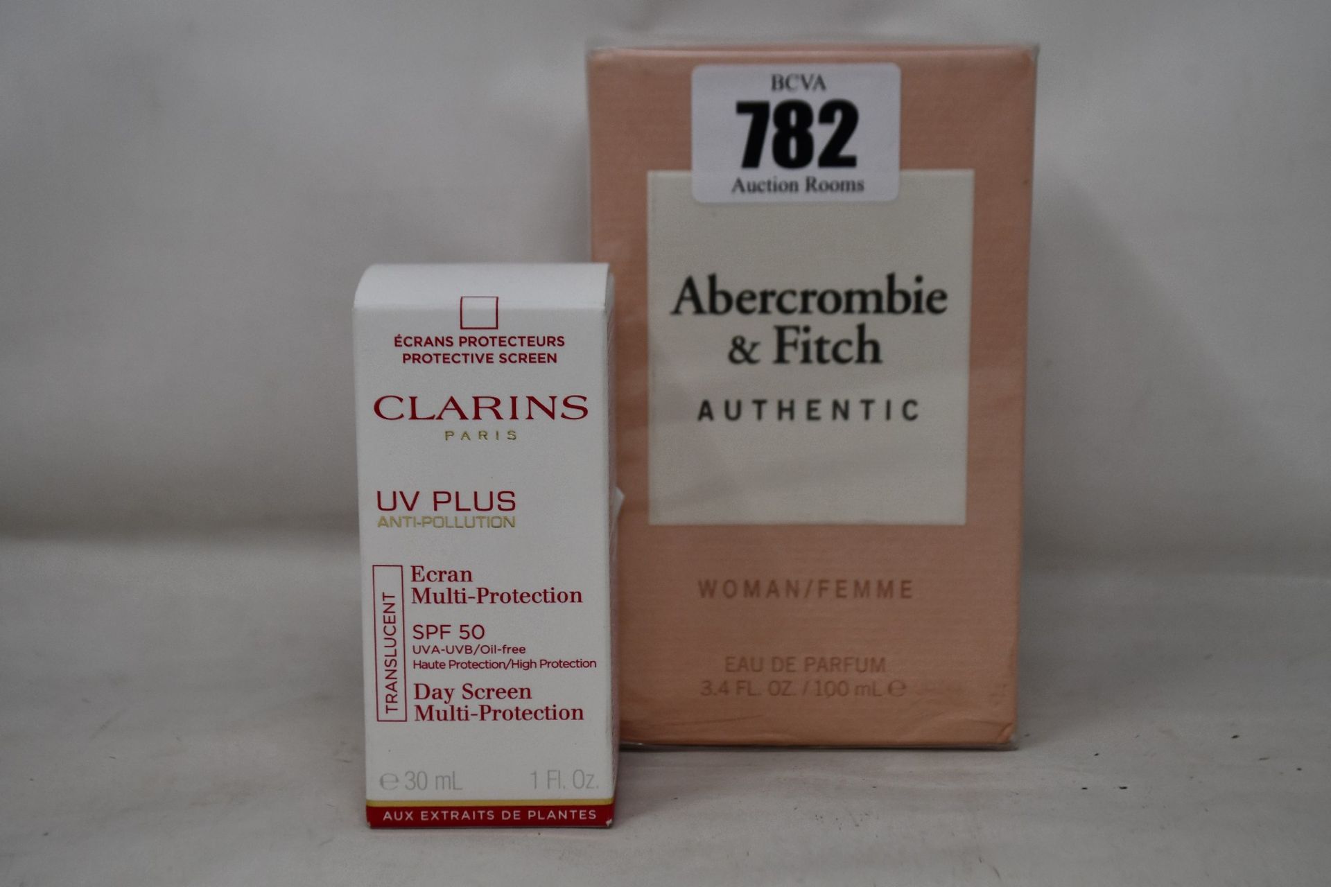 Two boxed as new Abercrombie & Finch Authentic for Women eau de parfum (2 x 100ml) and two Clarins