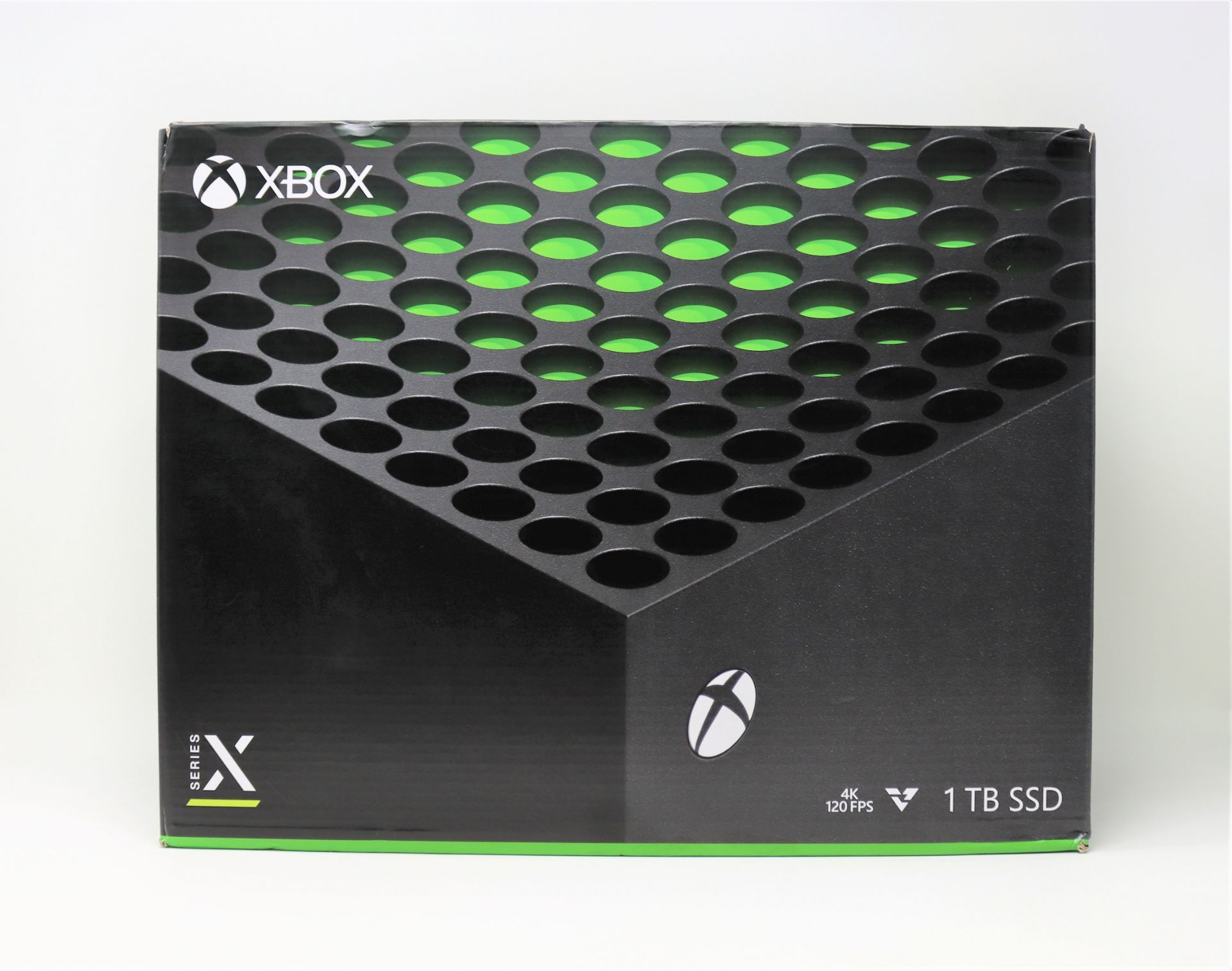 A boxed as new Microsoft Xbox Series X 1TB Console (Box sealed, some damage to one seal).