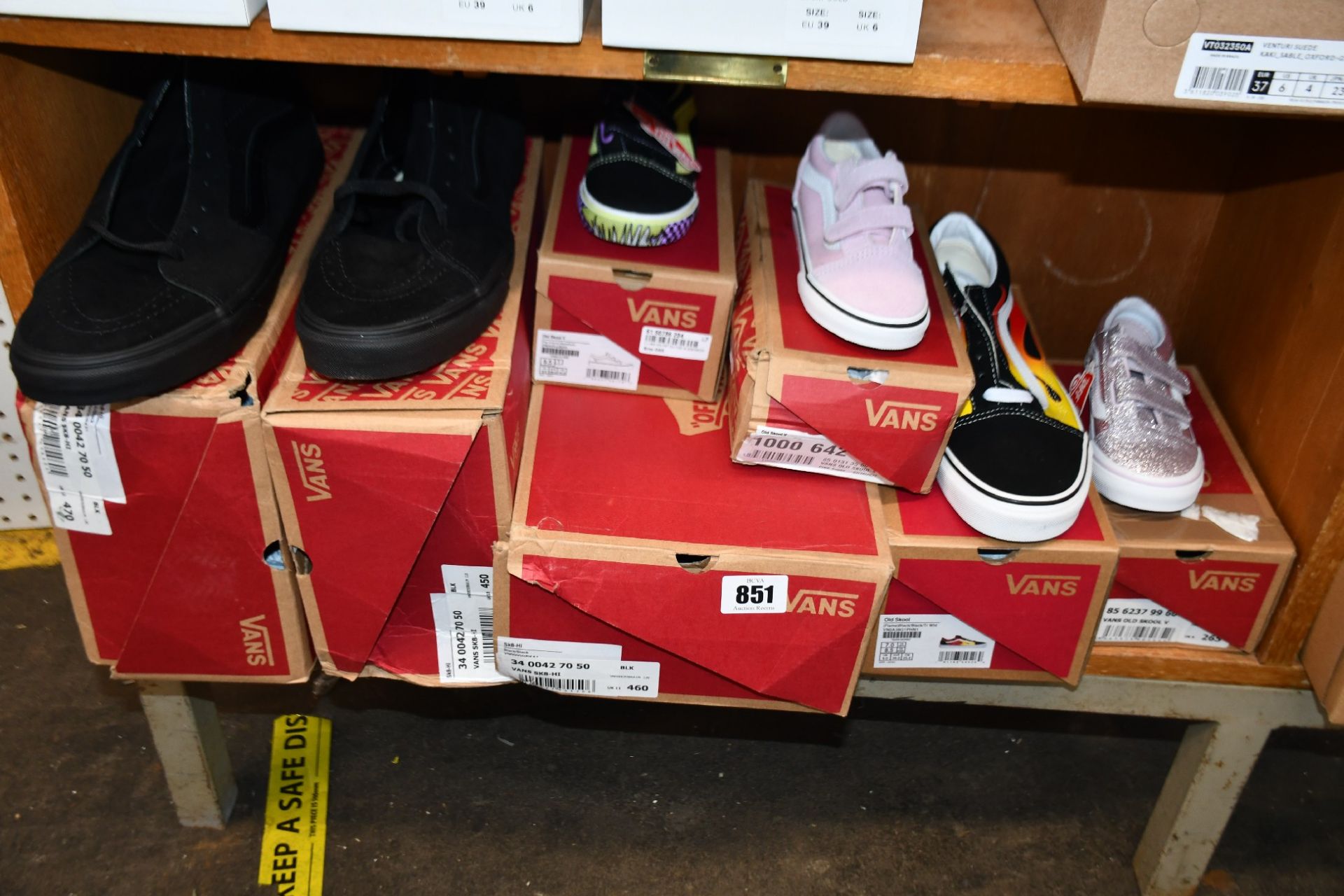 Seven pairs of assorted as new Vans footwear (Adults and children's).