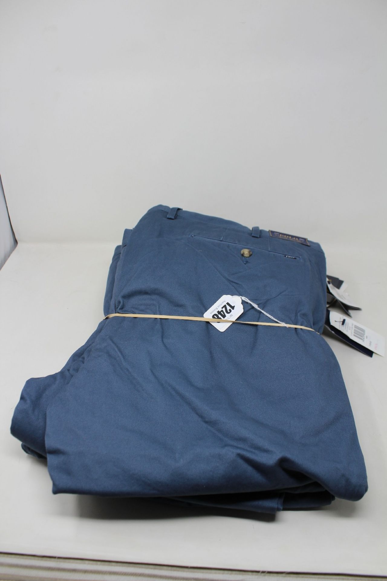 Six pairs of as new Ralph Lauren pants in blue (Assorted sizes).