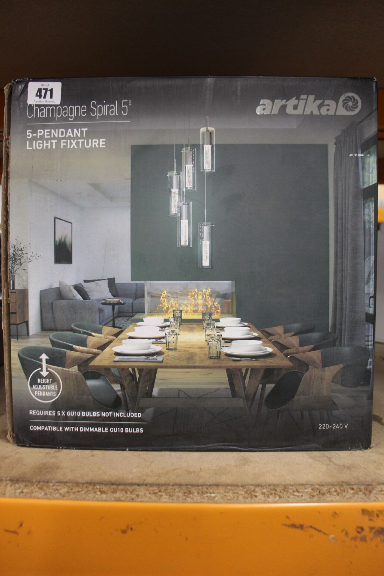 A boxed as new Artika Champagne Spiral 5-pendant light fixture.