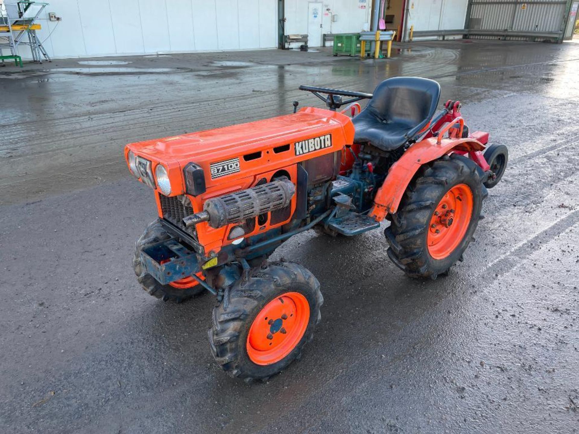 Kubota B7100D 4wd diesel compact tractor with rear linkage and PTO on 6-12 front and 8-16 rear. Hour