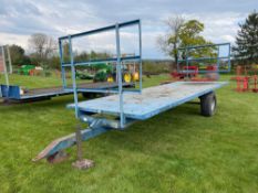 1991 AS Marston BT5 20ft flat bed single axle bale trailer with front and rear raves, metal floor. S