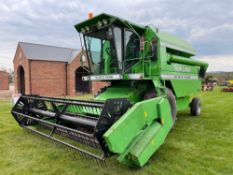 1996 Deutz Fahr Starliner 4045H combine harvester with 14ft header and trolley on 23.1-26 front and