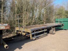 24ft single axle bale trailer with front and rear bale raves, wooden floor