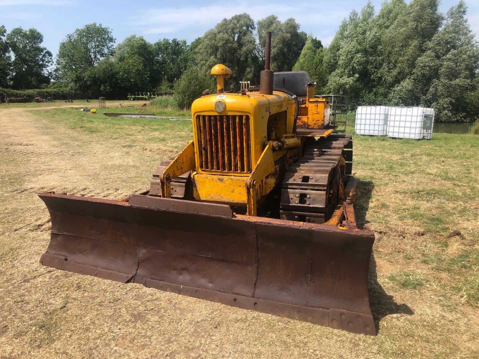 Track Marshall 55 metal tracked diesel crawler with rear linkage, drawbar, cab and front dozer blade