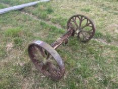 Pair cast iron wheels with axle. No VAT.